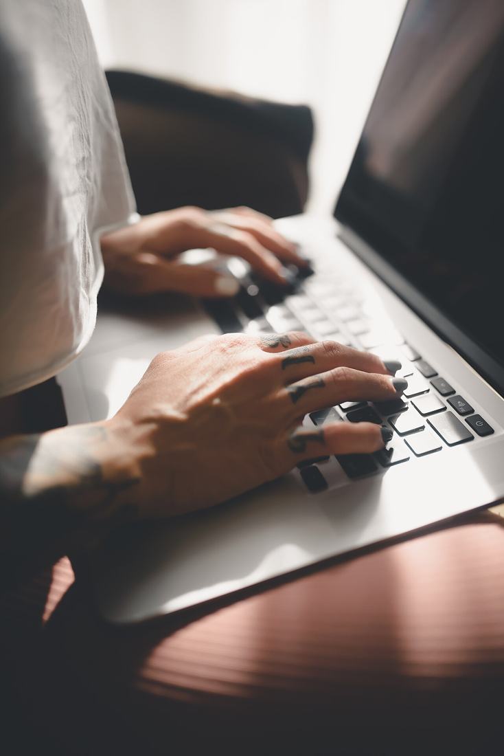 Hands typing on a laptop keyboard. Most people apply online at ssa.gov. Photo: Wikimedia Commons, CC BY 2.0.