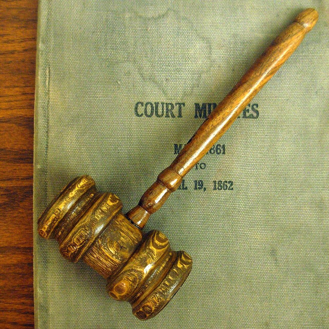 A judge's gavel. The decision follows a fixed five-step sequence, not a single judgment call. Photo: Wikimedia Commons, CC BY-SA 4.0.