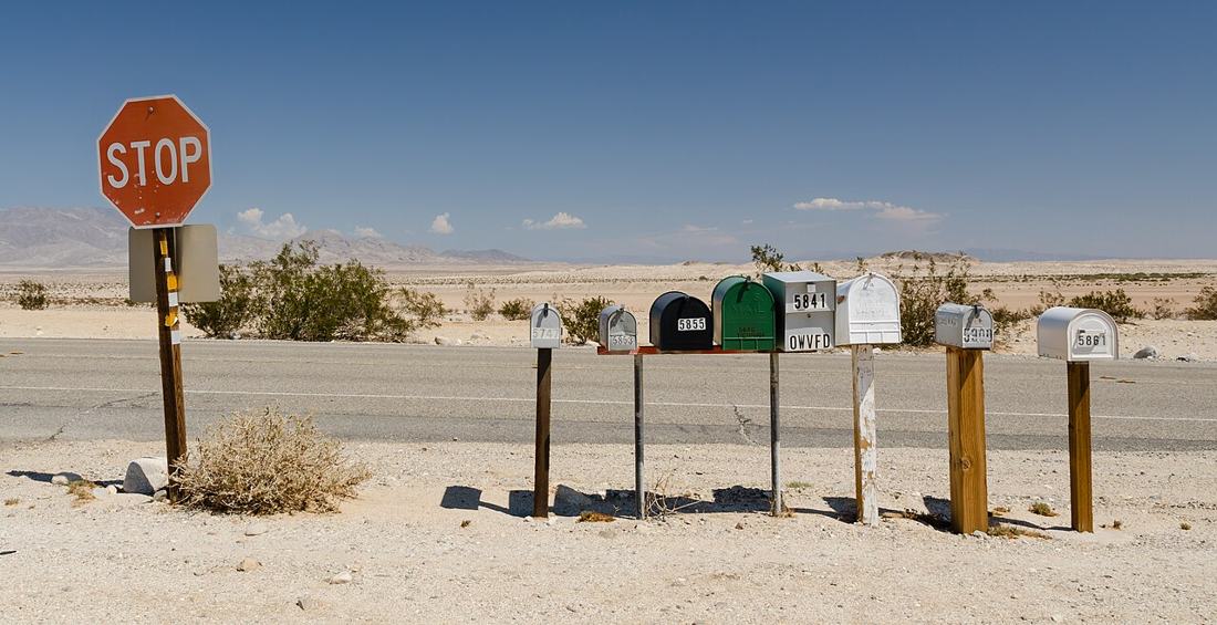 Letterboxes in a row. SSA decisions and notices arrive by mail — watch for them. Photo: Wikimedia Commons, CC BY-SA 3.0.