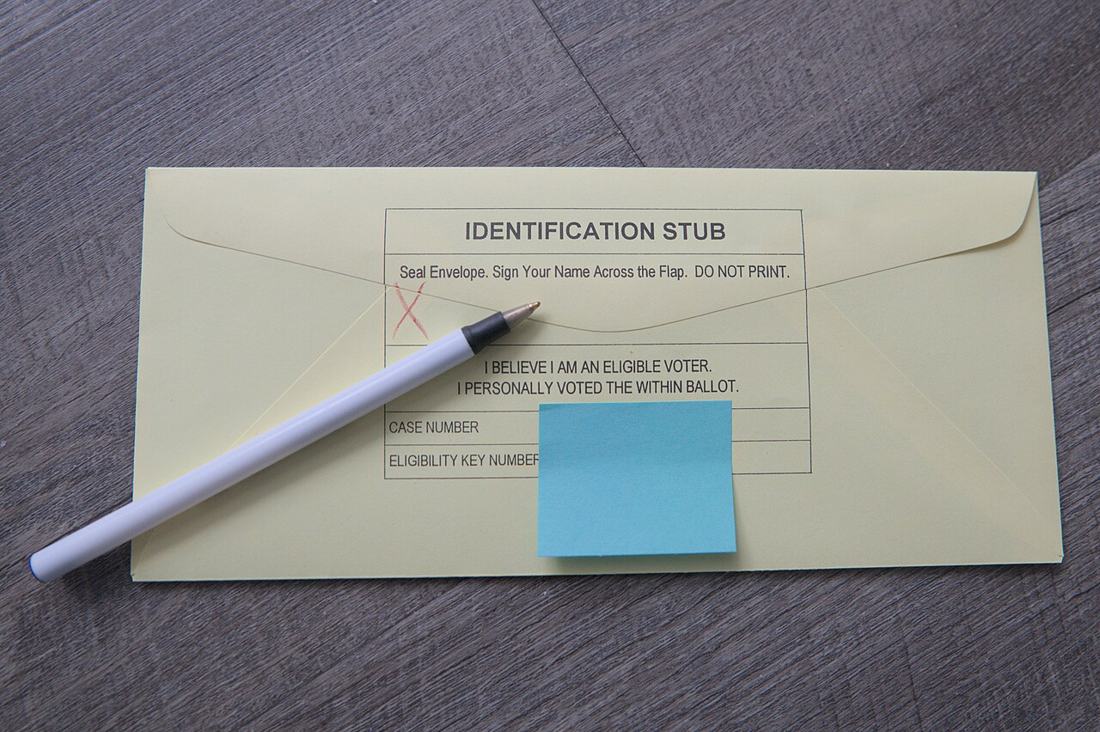 A sealed envelope and a pen. Keep copies of everything you send and receive. Photo: Wikimedia Commons, CC BY-SA 4.0.